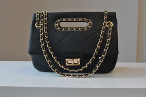 BLACK GUILTED HANDBAG WITH CUTOFF  HANDLE AND GOLD CHAIN