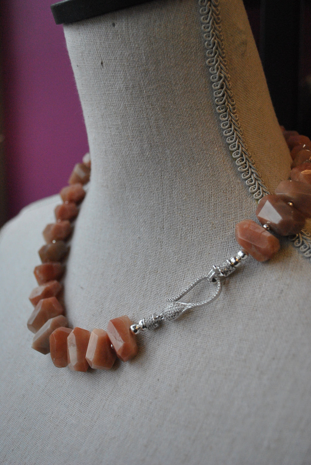 ORANGE SUNSTONE AND RHINESTONE CLASP ASYMMETRIC NECKLACE