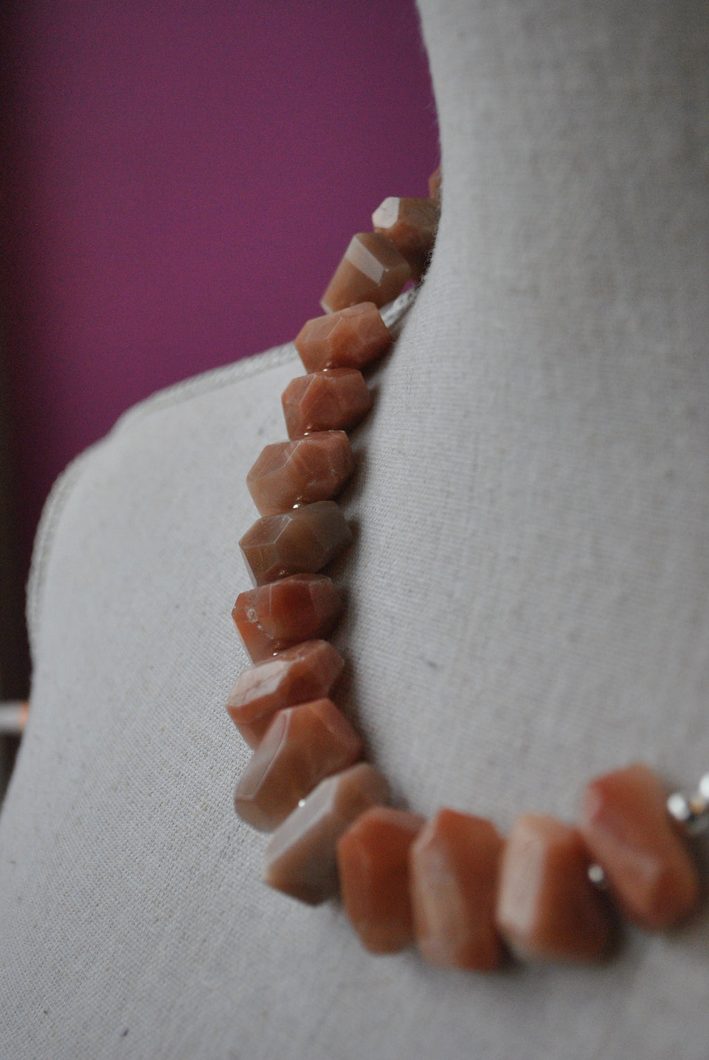 ORANGE SUNSTONE AND RHINESTONE CLASP ASYMMETRIC NECKLACE