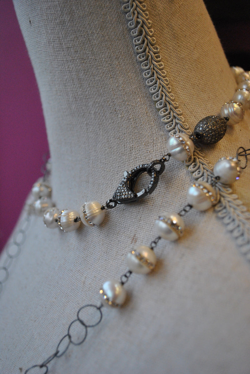 WHITE FRESHWATER PEARLS WITH SWAROVSKI CRYSTALS AND GUNMETAL CHAIN LONG NECKLACE