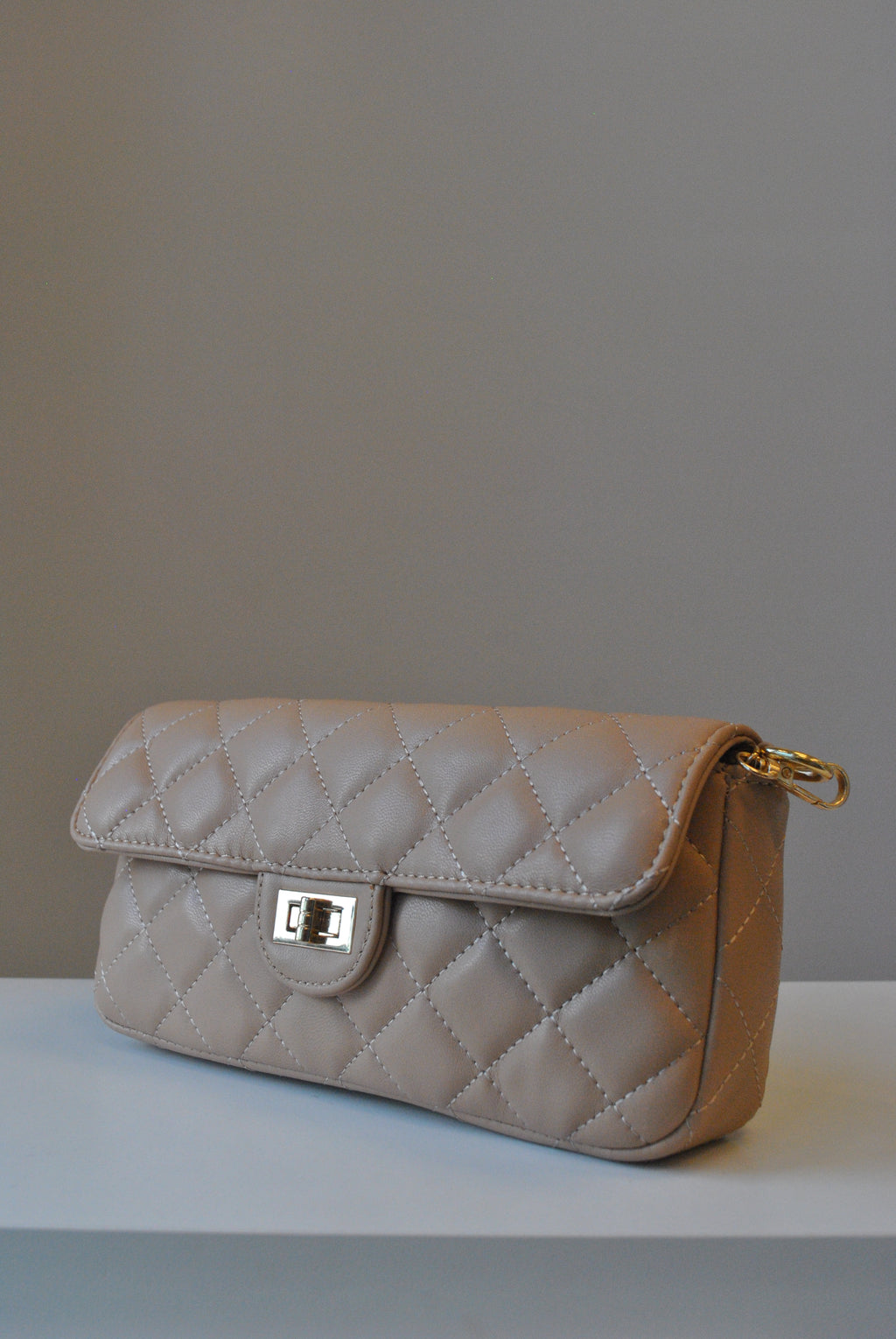 BEIGE GUILTED MINI CROSSBODY BAG OR A CLUTCH