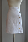 WHITE MINI SKIRT WITH BUTTONS