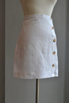 WHITE MINI SKIRT WITH BUTTONS