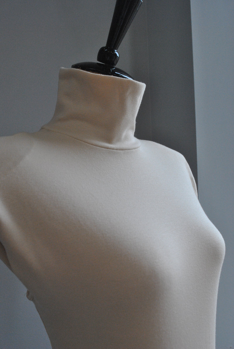 LIGHT CREAM TOP WITH HIGH NECK AND PADDED SHOULDERS
