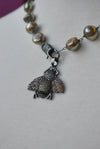 OLIVE GREEN FRESHWATER PEARLS NECKLACE WITH A BEE PENDANT