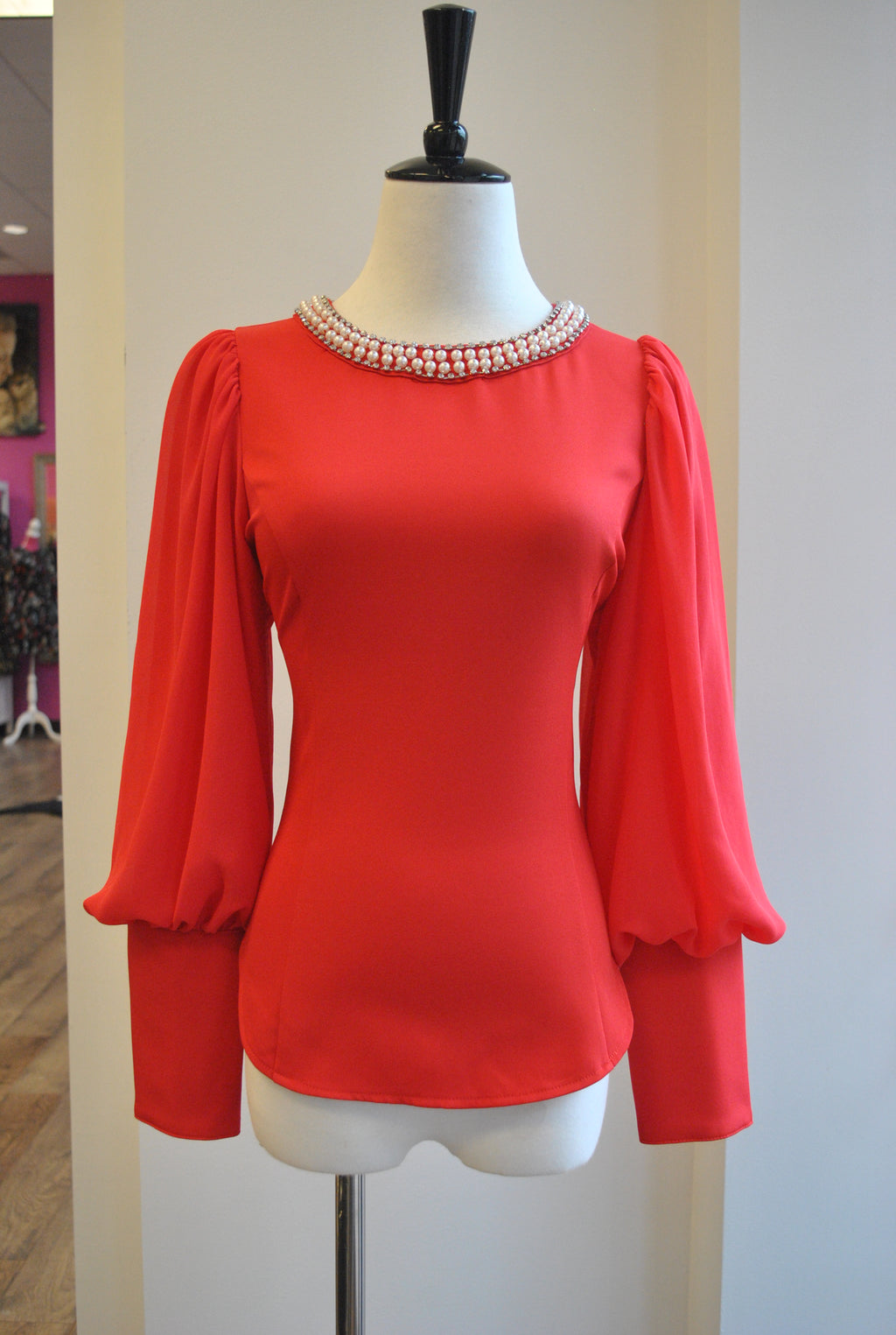 RED TOP WITH BELL SLEEVES AND PEARL NECK