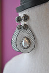 MOTHER OF PEARLS AND SWAROVSKI CRYSTALS ON GREY LEATHER STATEMENT EARRINGS