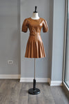 CARAMEL FAUX LEATHER PLEATED DRESS WITH A BELT
