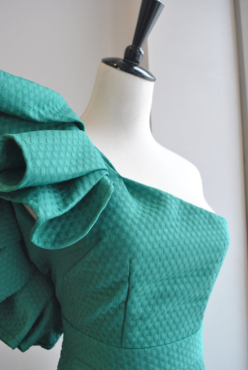 ASYMMETRIC GREEN DRESS WITH RUFFLES