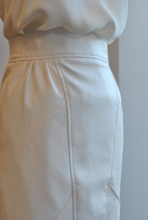 IVORY FAUX LEATHER SKIRT WITH POCKETS