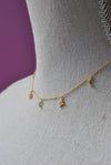 GOLD CHOKER STYLE NECKLACE WITH STAR CHARMS