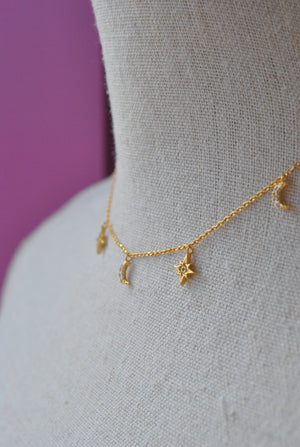 GOLD CHOKER STYLE NECKLACE WITH STAR CHARMS
