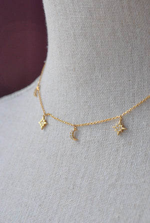 GOLD CHOKER STYLE NECKLACE WITH STAR CHARMS