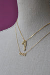 GOLD CHOKER STYLE NECKLACE WITH "BOSS" CHARM