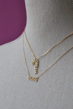 GOLD CHOKER STYLE NECKLACE WITH "BOSS" CHARM