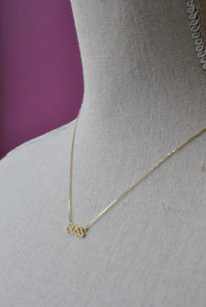 GOLD CHOKER STYLE NECKLACE WITH "BOSS" CHARM