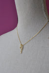 GOLD DELICATE NECKLACE WITH A "DREAM BIG" PENDANT