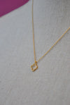 GOLD CHOKER STYLE NECKLACE WITH "BOSS" CHARM