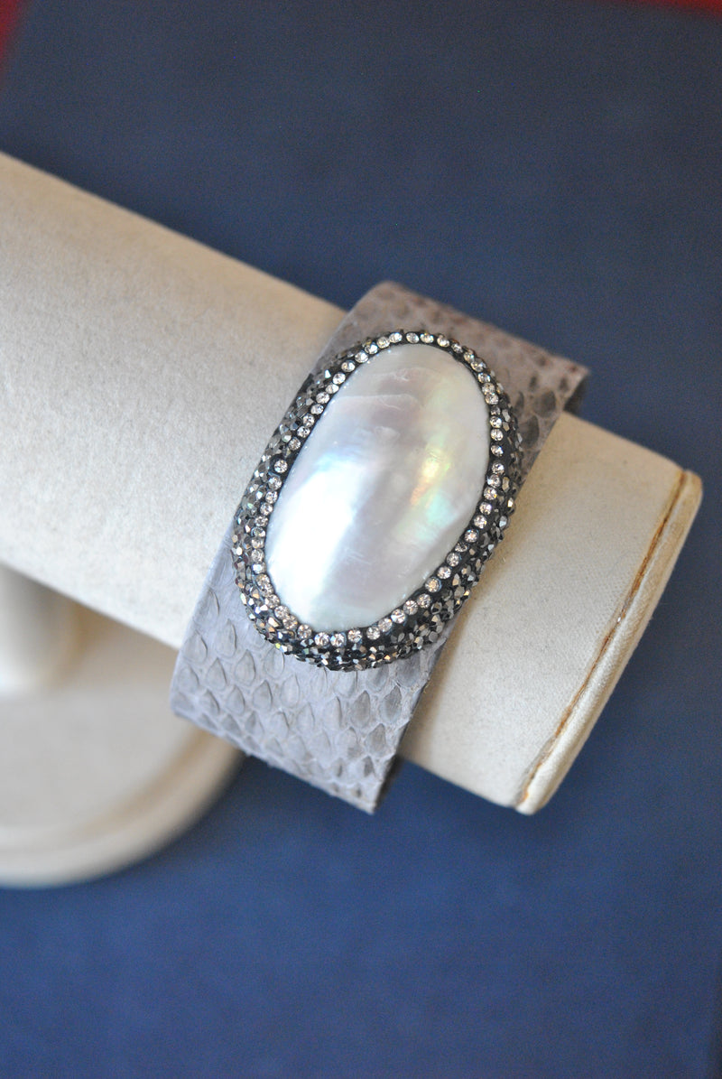 GREY ECO LEATHER CUFF WITH WHITE SHELL AND SWAROVSKI CRYSTALS