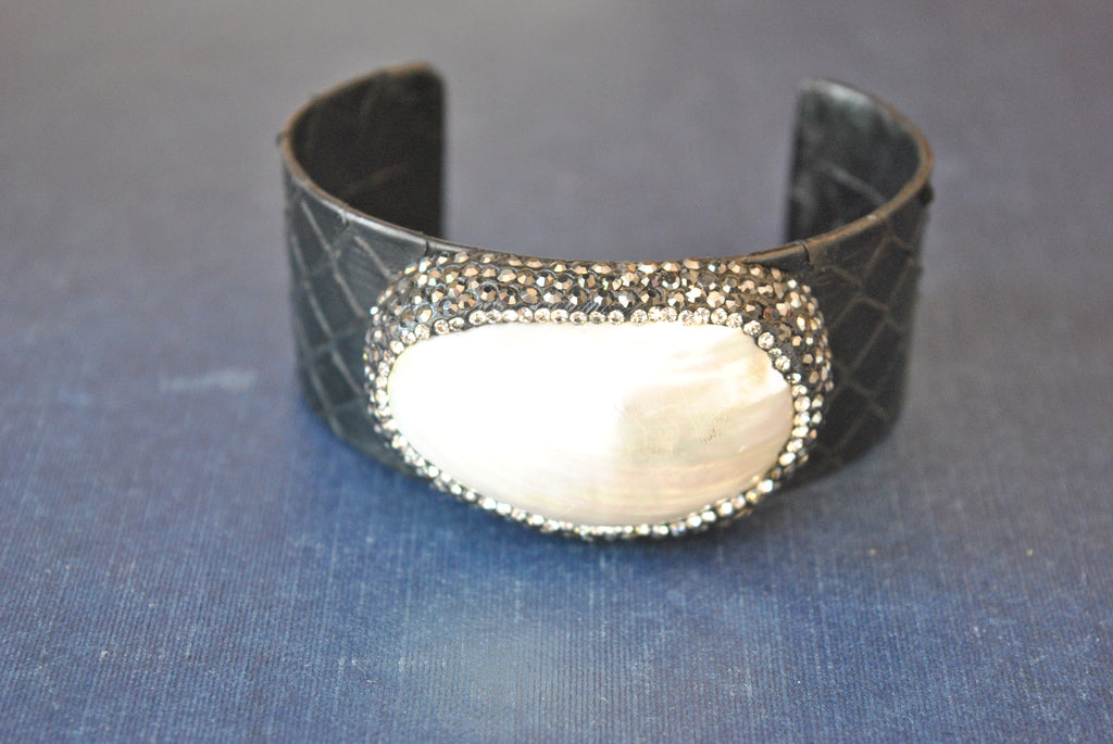 BLACK ECO LEATHER CUFF WITH WHITE SHELL AND SWAROVSKI CRYSTALS
