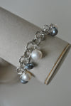 WHITE FRESHWATER PEARLS AND GREY MOONTONE CHARM BRACELET