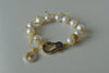 WHITE FRESHWATER PEARLS ON GOLD DOUBLE BRACELET