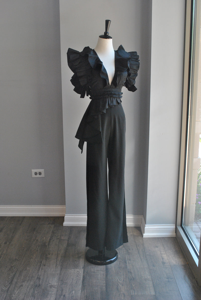 BLACK JUMPSUIT WITH STATEMENT RUFFLE SLEEVES