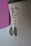 MOONSTONE AND RHINESTONES FEATHERS WITH GUNMETAL FINISHED LONG EARRINGS